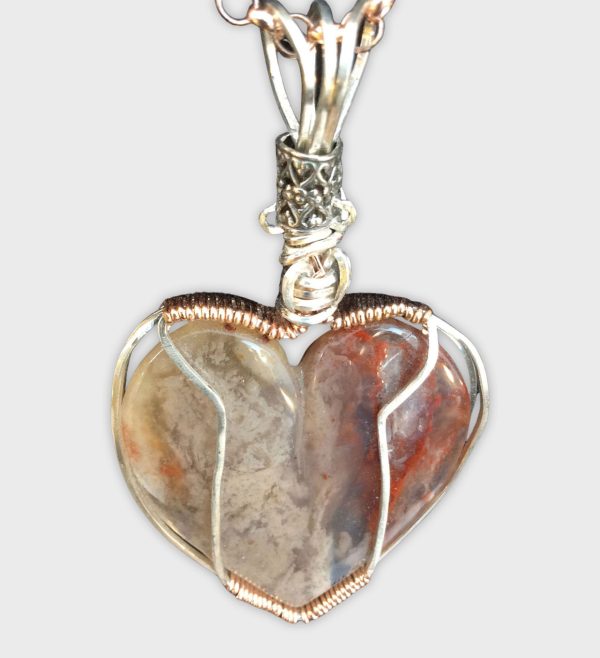 Plume agate, a chalcedony formed in hydrothermal volcanic environments